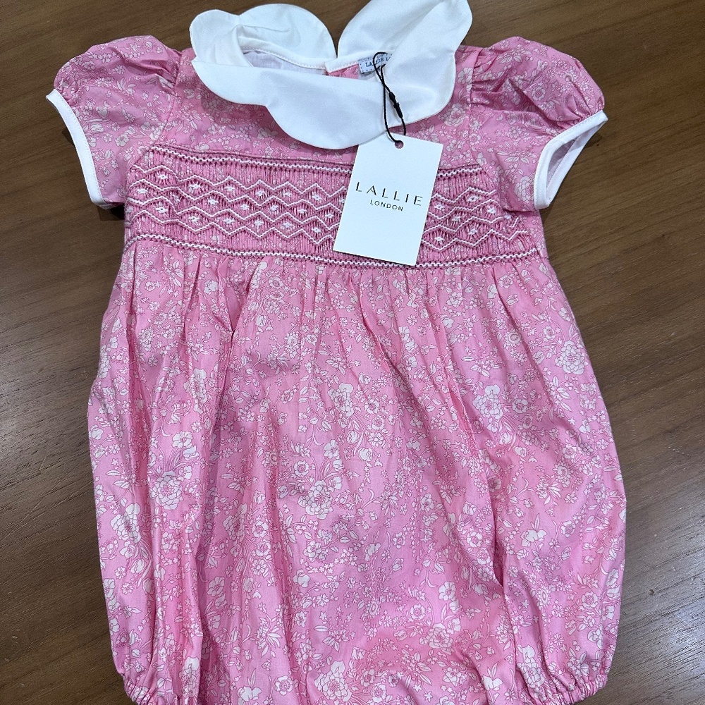 Pink floral body suit